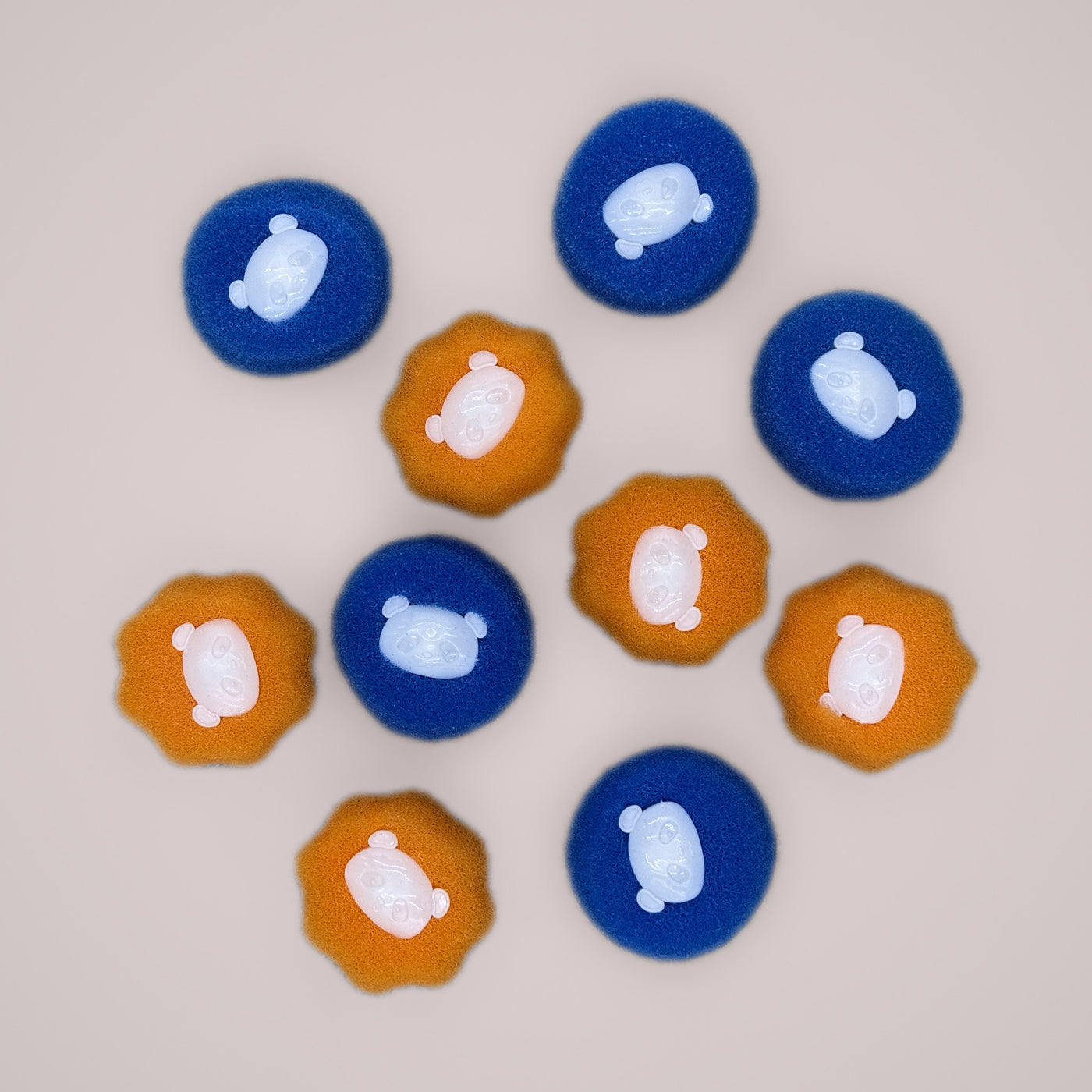 Holmere reusable laundry fur catchers — the full ten-pack, blue and orange
