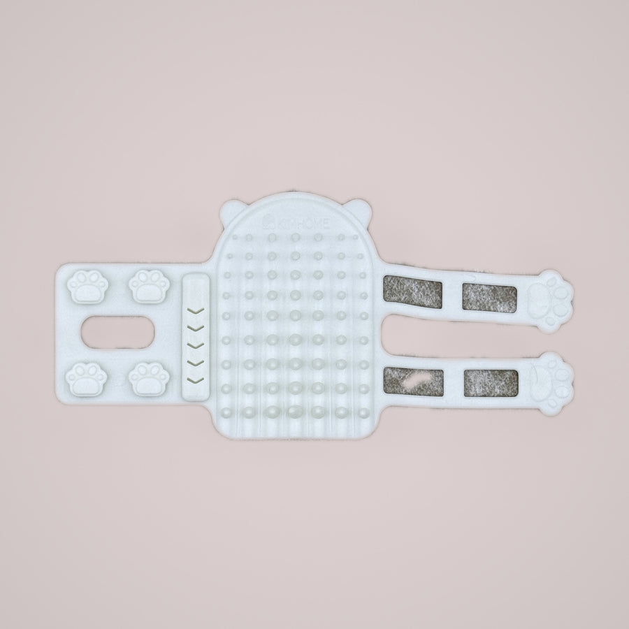 Holmere silicone corner grooming comb in white — nubbed pad with mounting straps