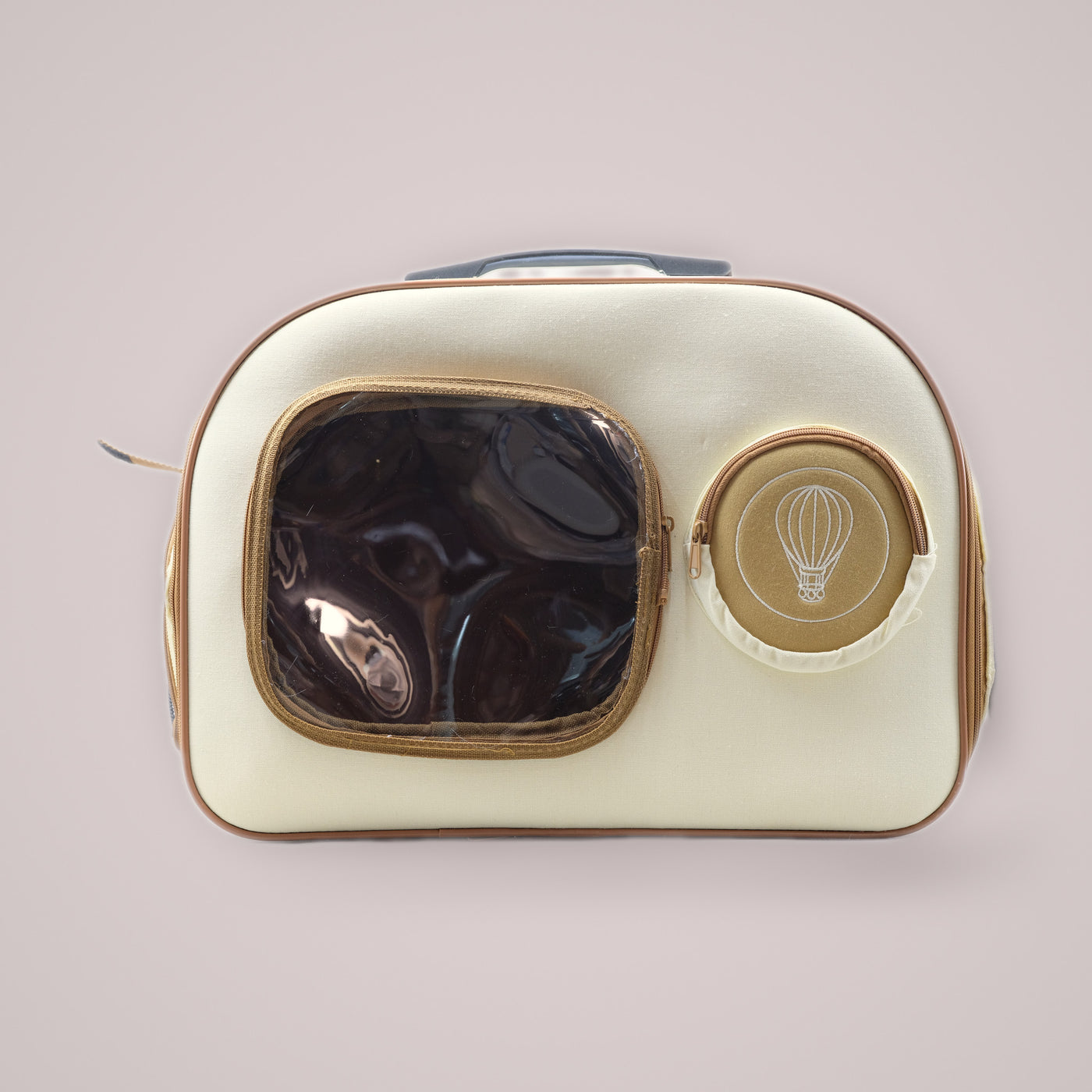 Holmere cat carrier backpack in beige — straight-on front with clear window and circular pocket