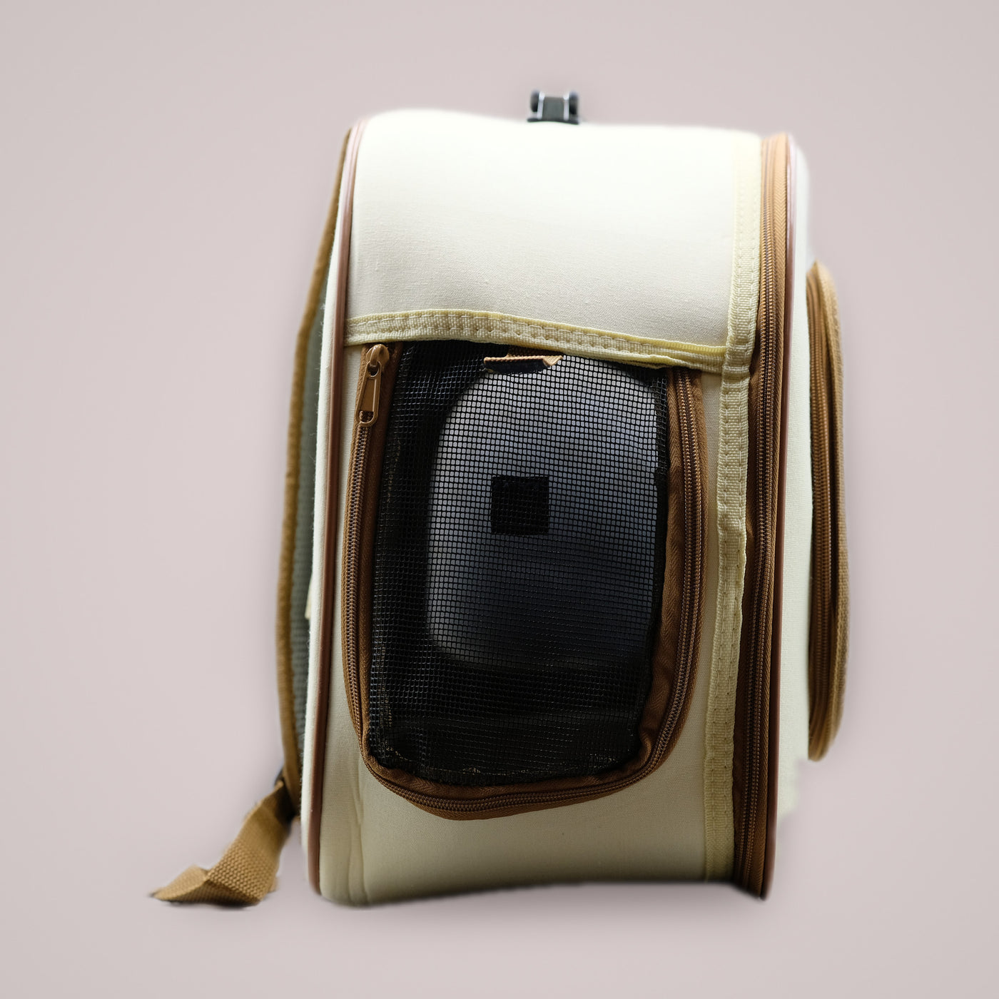 Holmere cat carrier backpack — three-quarter view with the window panel